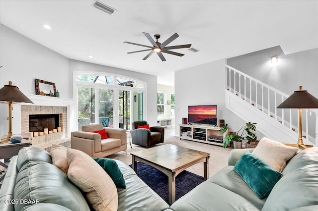2 Bulows Lndg, Flagler Beach, FL 32136 - living room featuring stairs, a ceiling fan, carpet, a brick fireplace, and recessed lighting