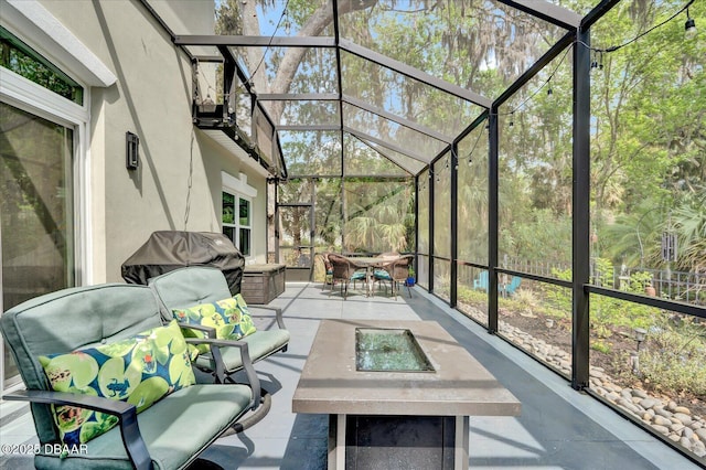 2 Bulows Lndg, Flagler Beach, FL 32136 - sunroom with outdoor dining area, an outdoor hangout area, and plenty of natural light