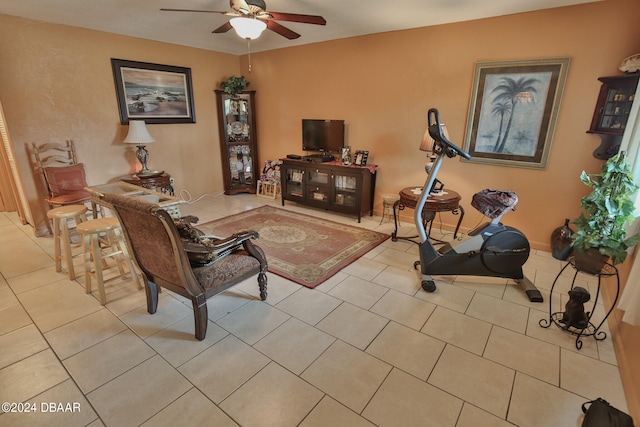 living room with light tile patterned floors and ceiling fan