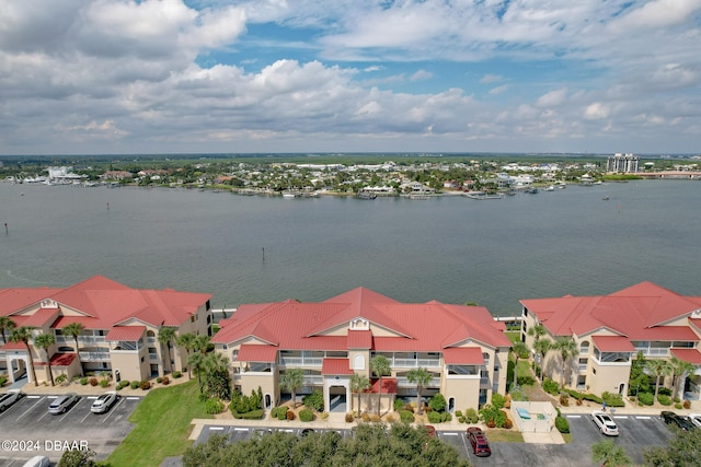 drone / aerial view with a water view