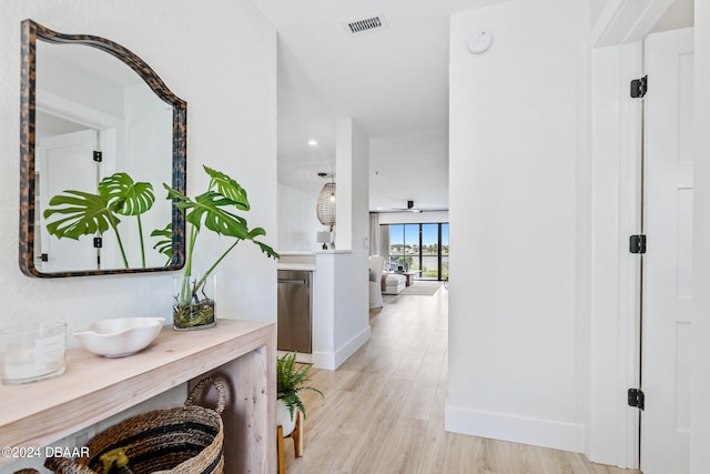 hallway featuring light hardwood / wood-style floors