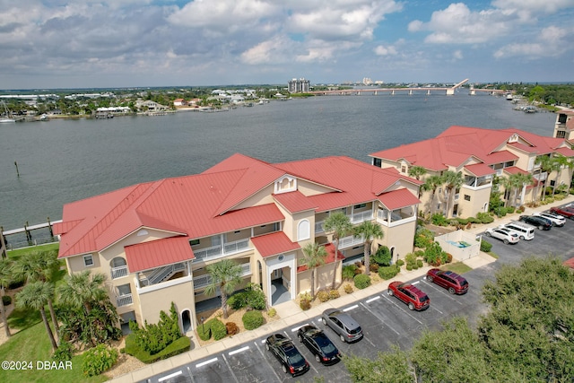 drone / aerial view with a water view