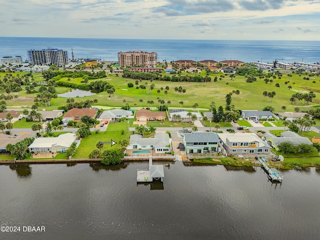 bird's eye view with a water view