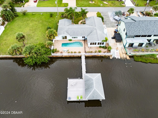 birds eye view of property featuring a water view