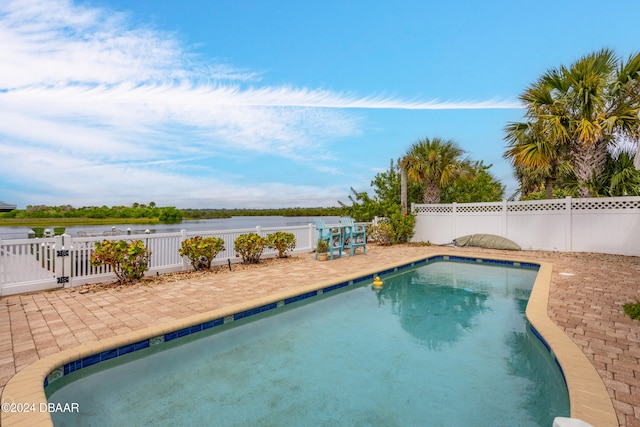 view of pool featuring a patio area