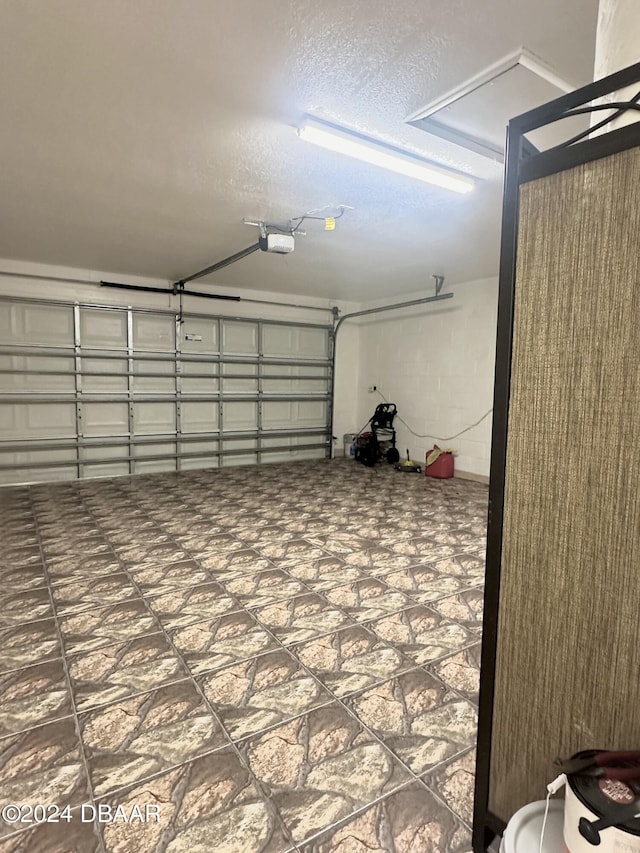5 Wild Rose Pl, Palm Coast, FL 32164 - garage with a garage door opener