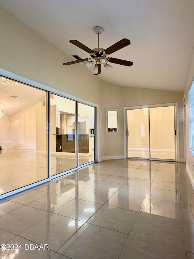 5 Wild Rose Pl, Palm Coast, FL 32164 - tiled spare room featuring lofted ceiling and ceiling fan