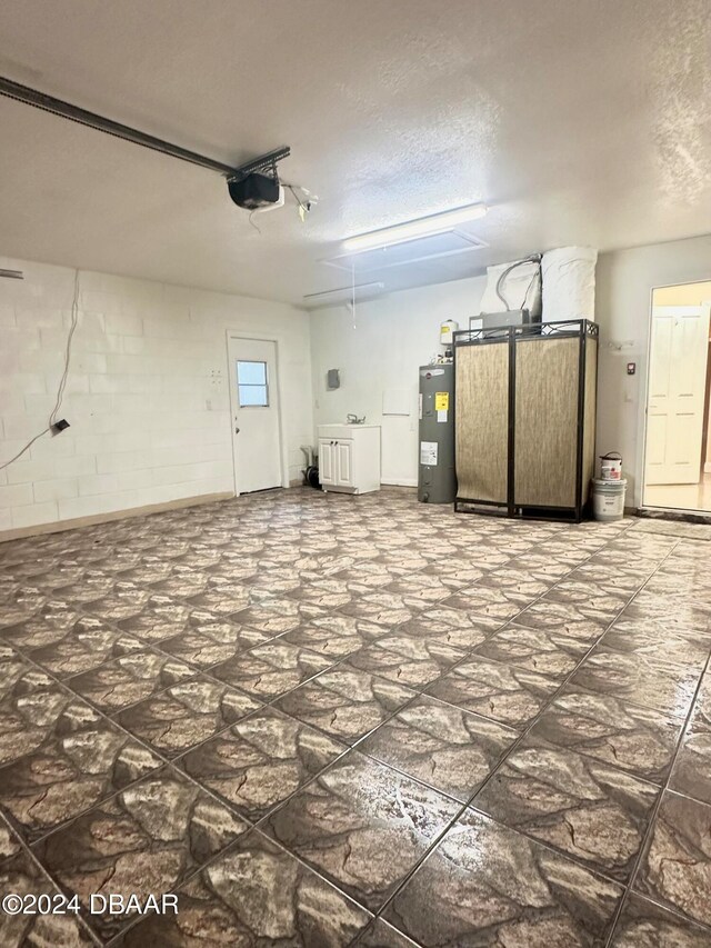5 Wild Rose Pl, Palm Coast, FL 32164 - garage featuring water heater and a garage door opener