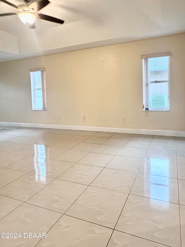 5 Wild Rose Pl, Palm Coast, FL 32164 - unfurnished room featuring ceiling fan and light tile patterned floors