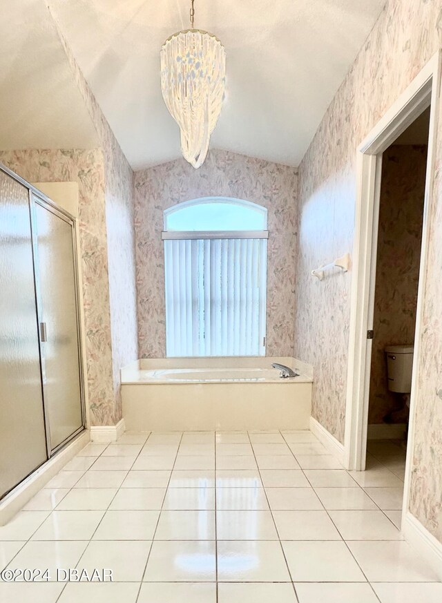 5 Wild Rose Pl, Palm Coast, FL 32164 - bathroom featuring toilet, an inviting chandelier, tile patterned flooring, and separate shower and tub
