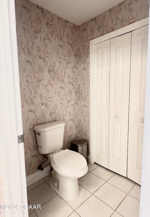 5 Wild Rose Pl, Palm Coast, FL 32164 - bathroom with toilet and tile patterned floors