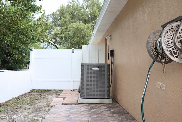 5 Wild Rose Pl, Palm Coast, FL 32164 - exterior space featuring central AC unit