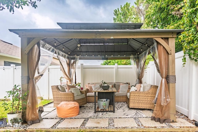 2756 Star Coral Ln, New Smyrna Beach, FL 32168 - fenced backyard with a gazebo and an outdoor hangout area