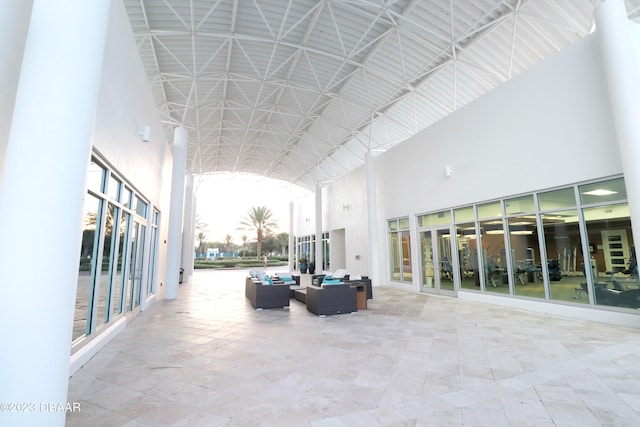 231 Riverside Dr Unit 2409, Holly Hill, FL 32117 - common area featuring a towering ceiling