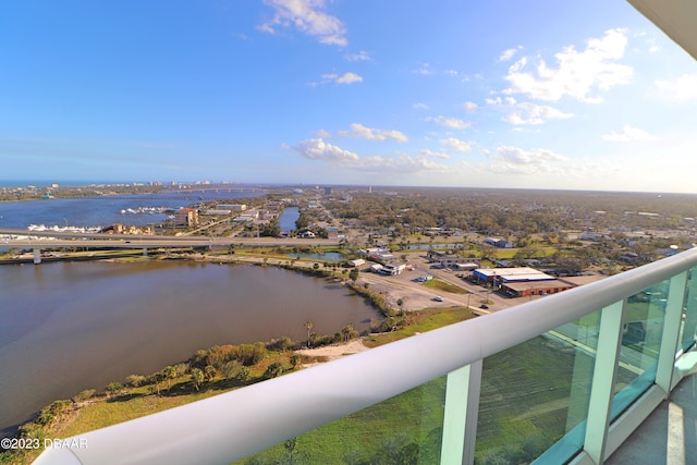 balcony featuring a water view