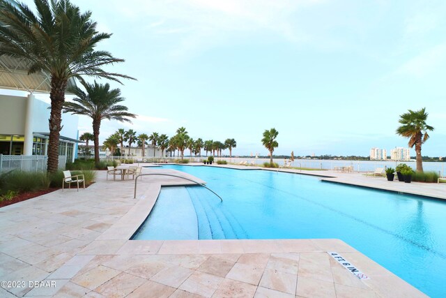 231 Riverside Dr Unit 2409, Holly Hill, FL 32117 - community pool with a patio
