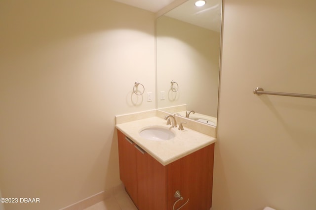 bathroom with vanity and tile patterned flooring