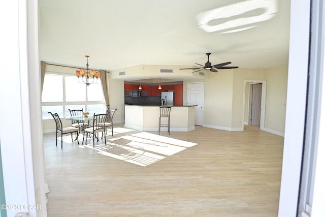 kitchen with dark countertops, visible vents, stainless steel appliances, and light wood-style floors