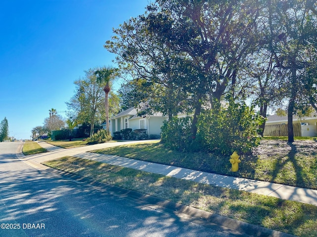 view of front of property with a front lawn