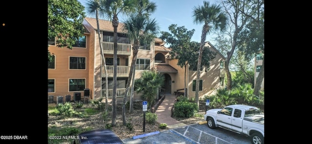 view of property featuring central air condition unit