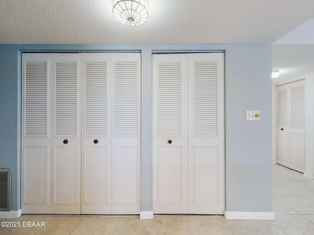 details with a textured ceiling