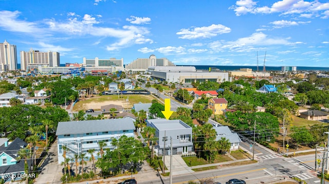 birds eye view of property with a view of city
