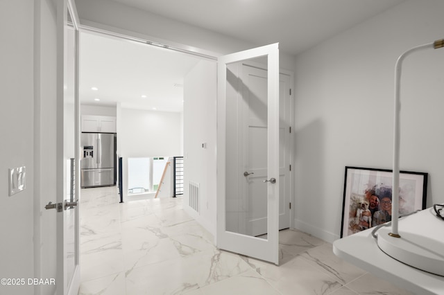 interior space featuring visible vents, baseboards, recessed lighting, french doors, and marble finish floor