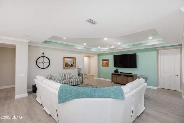 838 Attitude Ave, Daytona Beach, FL 32124 - living area with a raised ceiling, ornamental molding, baseboards, light wood finished floors, and ceiling fan