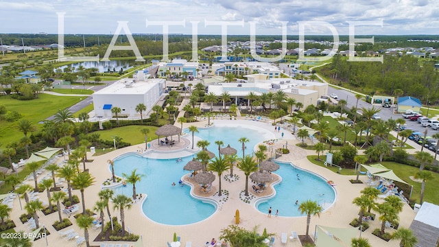 838 Attitude Ave, Daytona Beach, FL 32124 - aerial view of a pool area and a nearby body of water