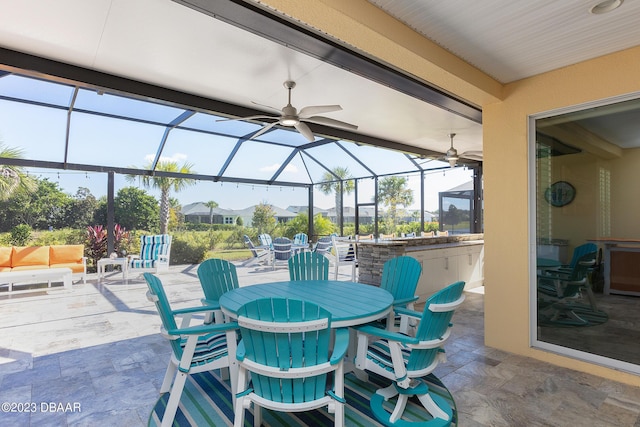 838 Attitude Ave, Daytona Beach, FL 32124 - view of patio with outdoor dining area, a lanai, a ceiling fan, and area for grilling