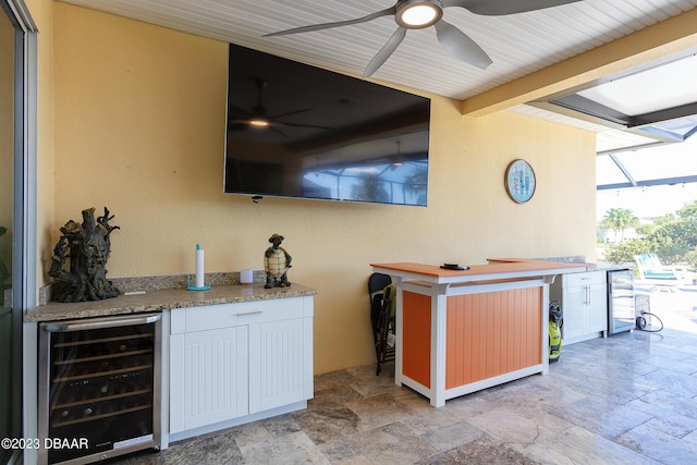 838 Attitude Ave, Daytona Beach, FL 32124 - view of patio with wine cooler, ceiling fan, and a lanai