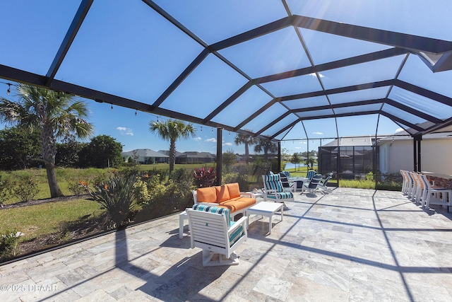 838 Attitude Ave, Daytona Beach, FL 32124 - view of patio / terrace featuring an outdoor living space and a lanai