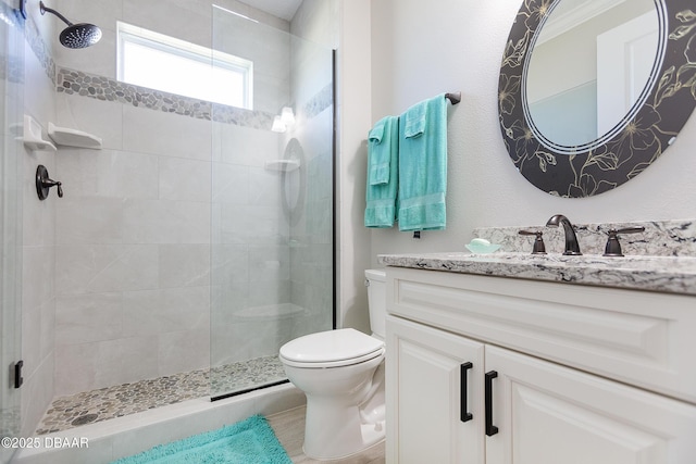 838 Attitude Ave, Daytona Beach, FL 32124 - bathroom featuring toilet, vanity, and a tile shower