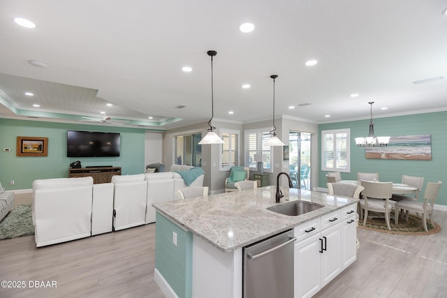 838 Attitude Ave, Daytona Beach, FL 32124 - kitchen with a sink, dishwasher, light wood-style floors, a ceiling fan, and ornamental molding