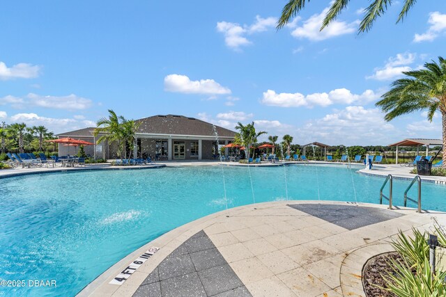 1363 Morning Walk Dr, Ormond Beach, FL 32174 - community pool featuring fence and a patio area