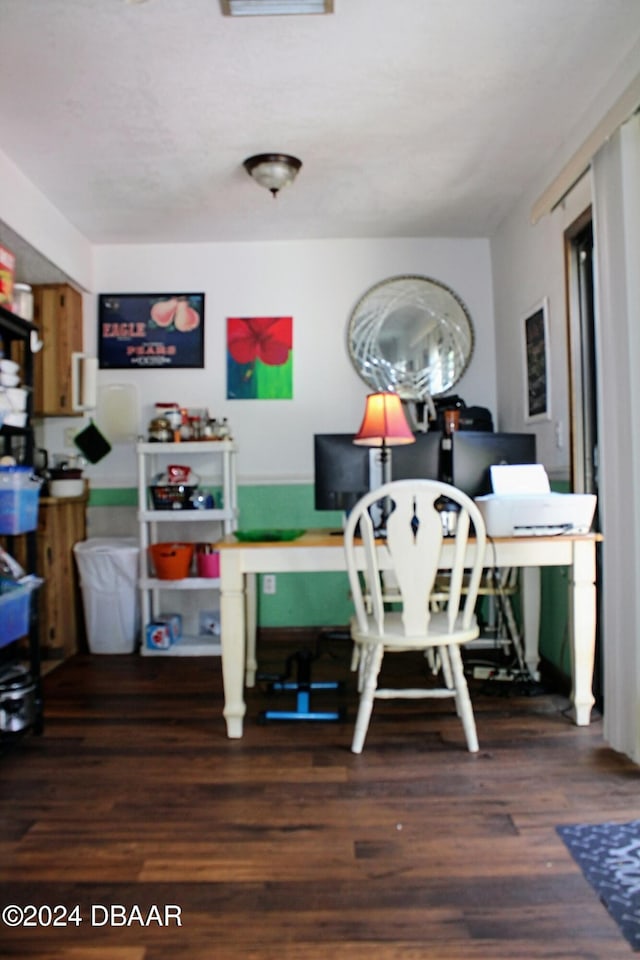 office with dark hardwood / wood-style floors