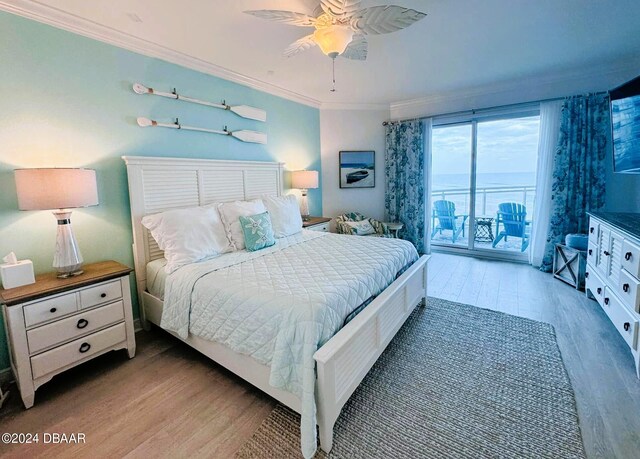 bedroom featuring ornamental molding, hardwood / wood-style flooring, ceiling fan, and access to exterior