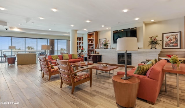 living room with light hardwood / wood-style flooring