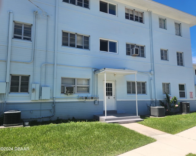 view of property featuring central AC and cooling unit