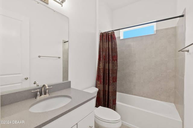 bathroom featuring toilet, shower / bathtub combination with curtain, and vanity