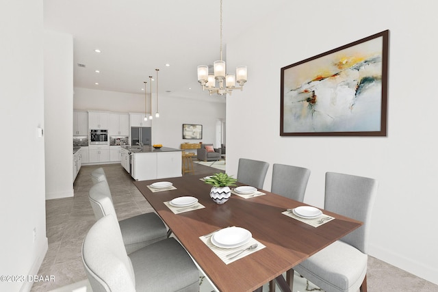 dining room with recessed lighting, baseboards, and an inviting chandelier