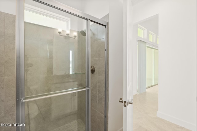 bathroom featuring an enclosed shower