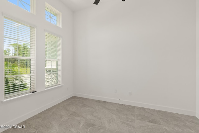 empty room featuring ceiling fan