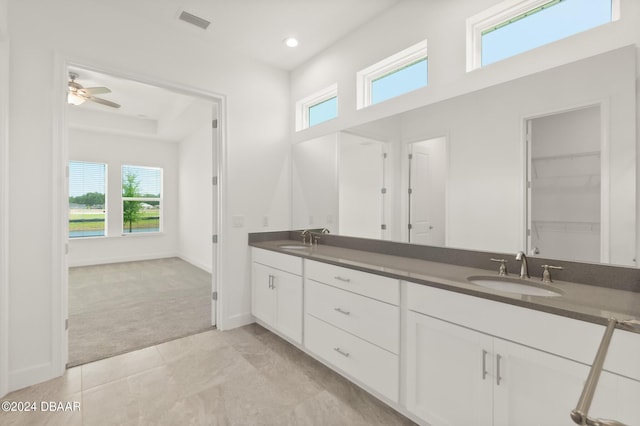 bathroom featuring vanity and ceiling fan