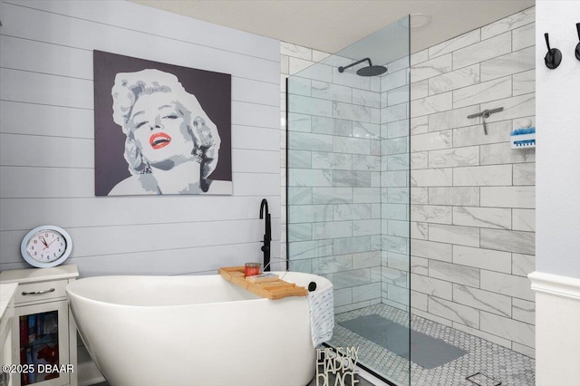 bathroom with a freestanding bath and a walk in shower