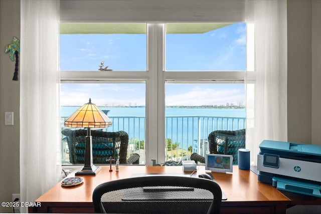 interior space with a healthy amount of sunlight and a water view