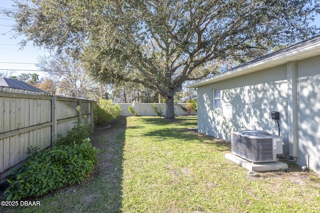 view of yard featuring central AC