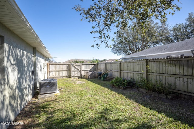 view of yard featuring central AC unit