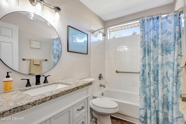 full bathroom featuring vanity, toilet, and shower / tub combo with curtain