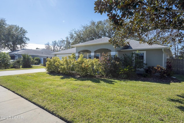 view of front of home featuring a front lawn